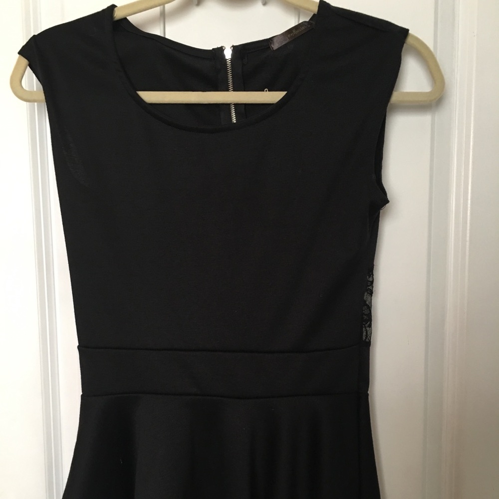 Peplum black too with zipper and lace on the back